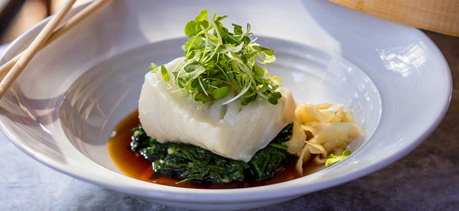 Eddie V's Takeout Menu features the Sea Bass to go.