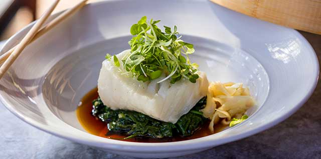 Eddie V's Takeout Menu features the Sea Bass to go.